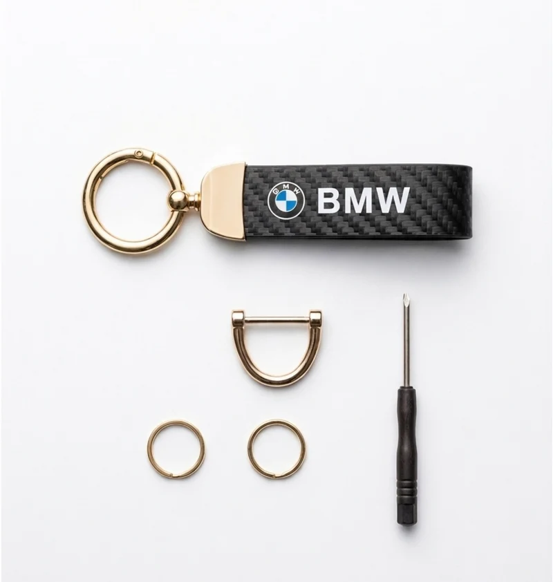 Sleutelhanger carbonlook met goudkleurige details – geschikt voor BMW